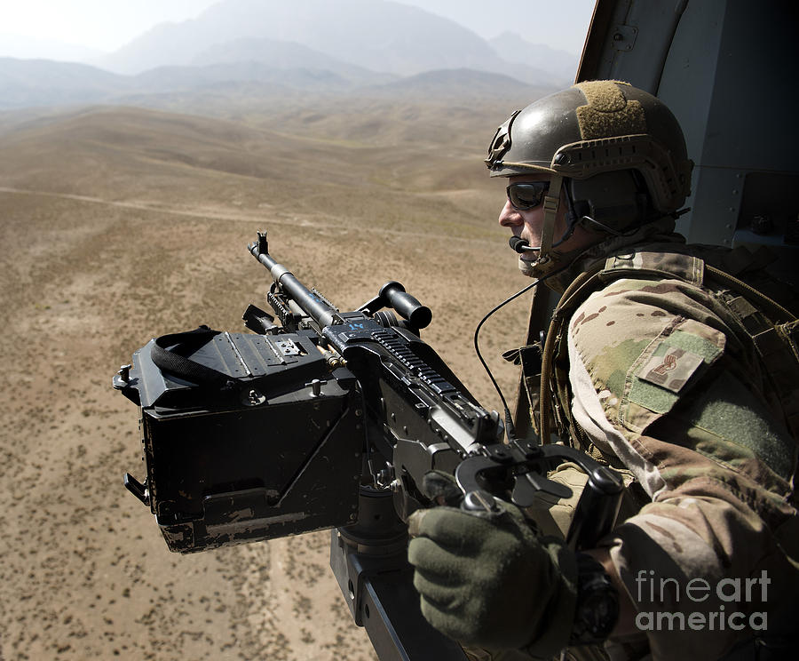 Door Gunner Scans The Terrain Photograph By Stocktrek Images