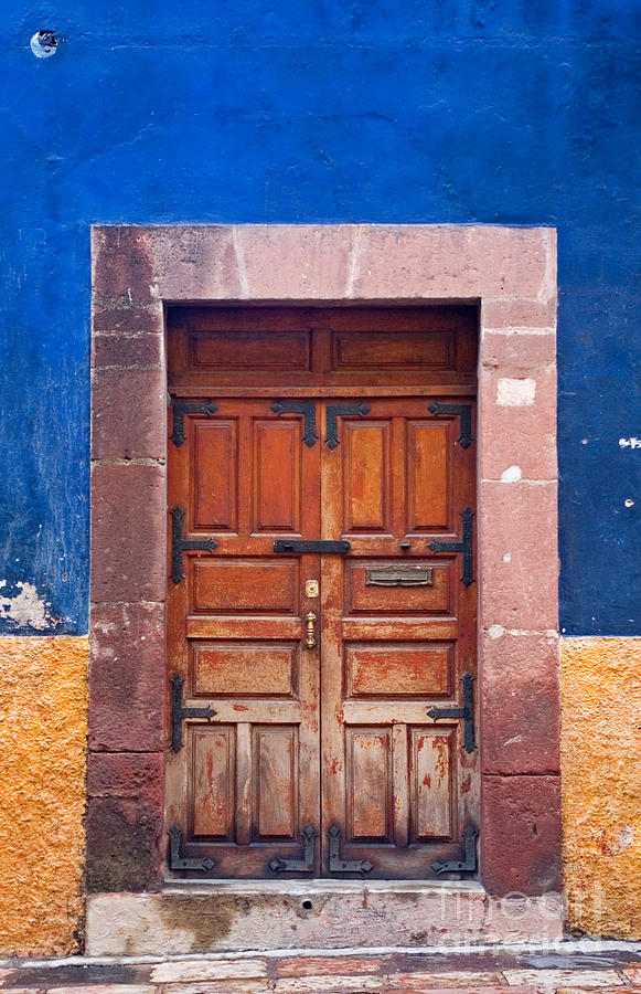 Door in Blue and Yellow Wall Photograph by Oscar Gutierrez