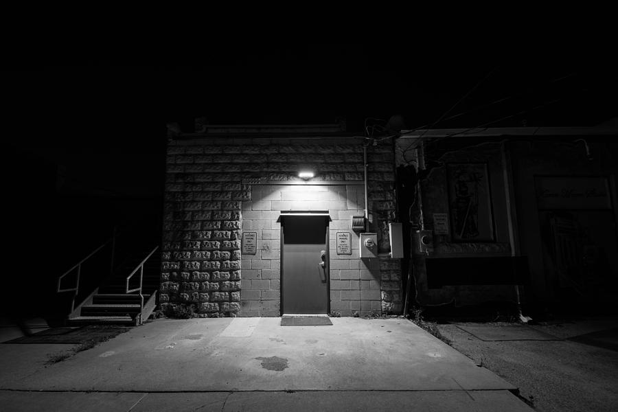 Door in the dark Photograph by Hillis Creative
