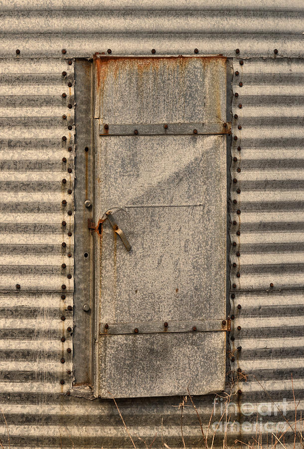 Door on an old metal silo Photograph by Les Palenik