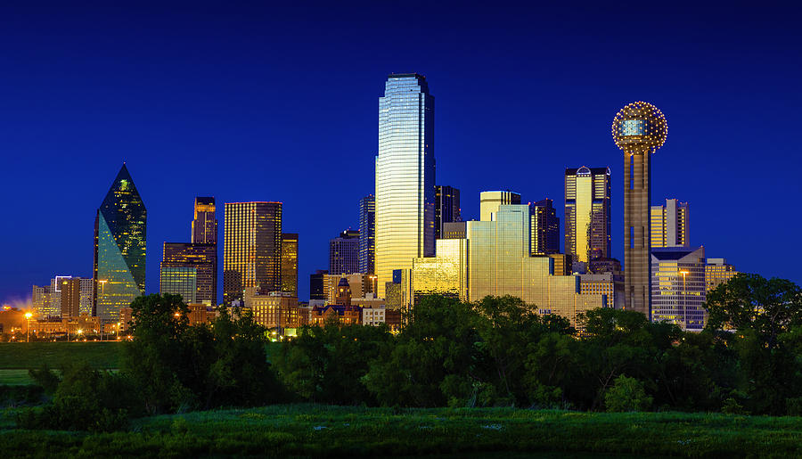 Downtown Dallas Cityscape Skyline Skyscrapers glowing at dusk / twilight Photograph by Dszc