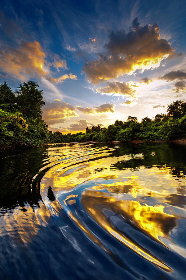 Dramatic Landscape On A River In The Photograph by Apomares
