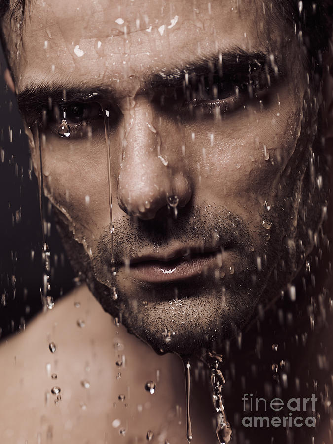 Dramatic portrait of man face with water pouring over it Photograph by Maxim Images Exquisite Prints