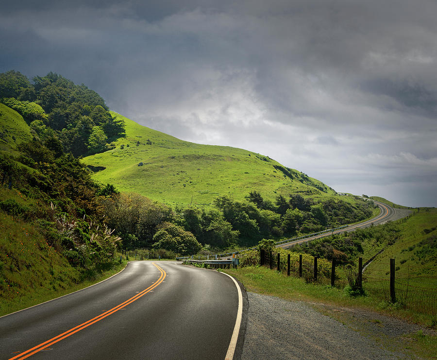 Dramatic Road Through Hilly Country Photograph by Ed Freeman