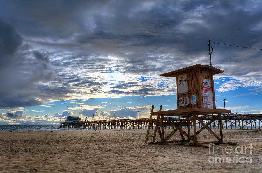 Dramatic Sky at Newport Beach Pier Photograph by Eddie Yerkish