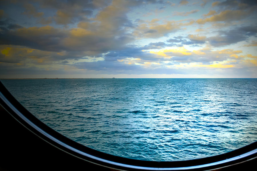 Dramatic Sky Over a Vast Ocean Photograph by Debbie Orlando - Fine Art ...