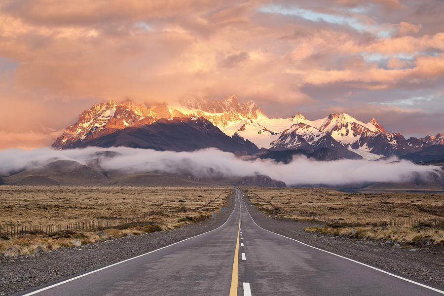Dramatic sky over empty highway in Argentina Patagonia Photograph by Grafissimo