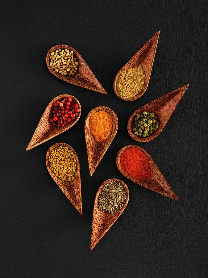 Dried Spices In Wooden Spoons Photograph by Science Photo Library