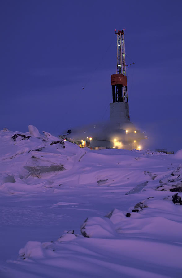 Drill rig at night on North Slope at Prudhoe Bay Alaska Photograph by Chris Arend