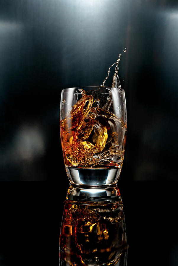 Drink Ice Cube Splash On Black Photograph by Chris Stein