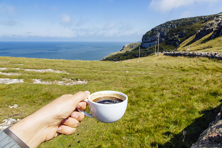 Drinking coffee from personal perspective and enjoying the view at Great Orme, Llandudno Photograph by Alexander Spatari