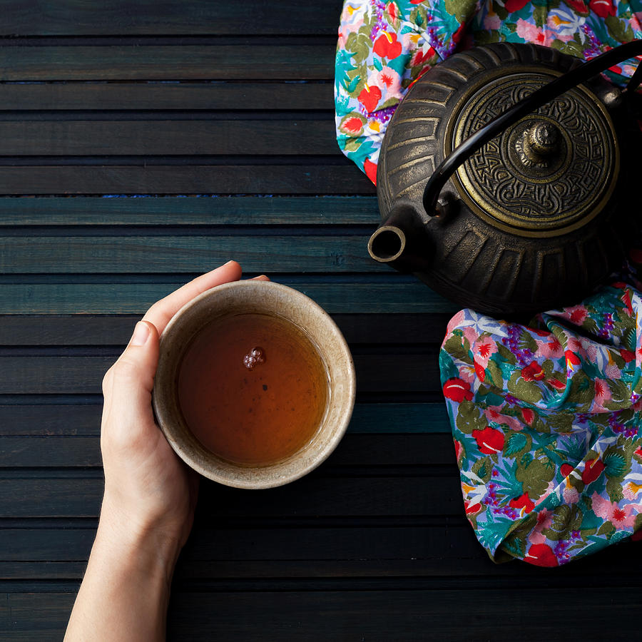 Drinking tea Photograph by Flavia Morlachetti