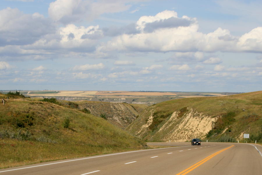 Driving to Drumheller Photograph by Betty-Anne McDonald