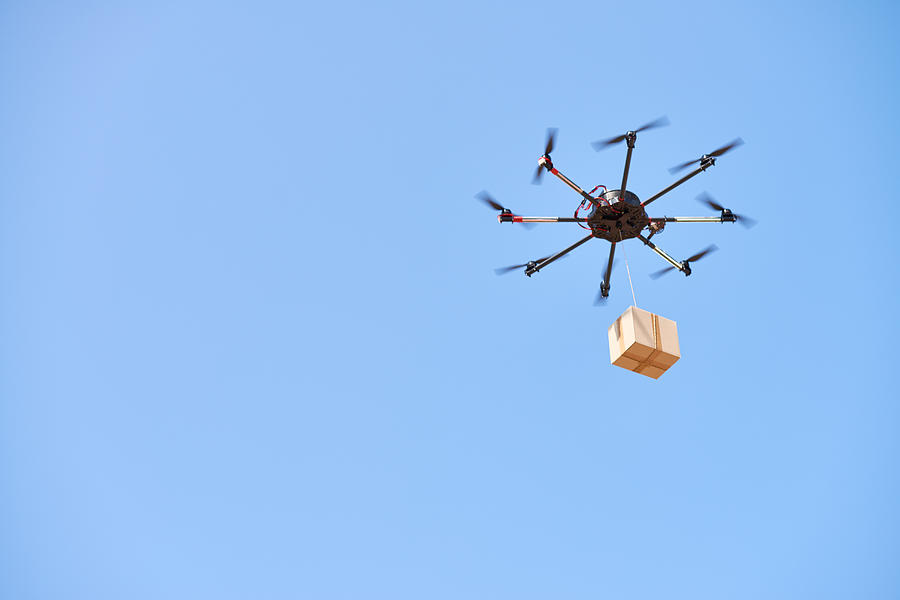 Drone delivery service Photograph by CliqueImages