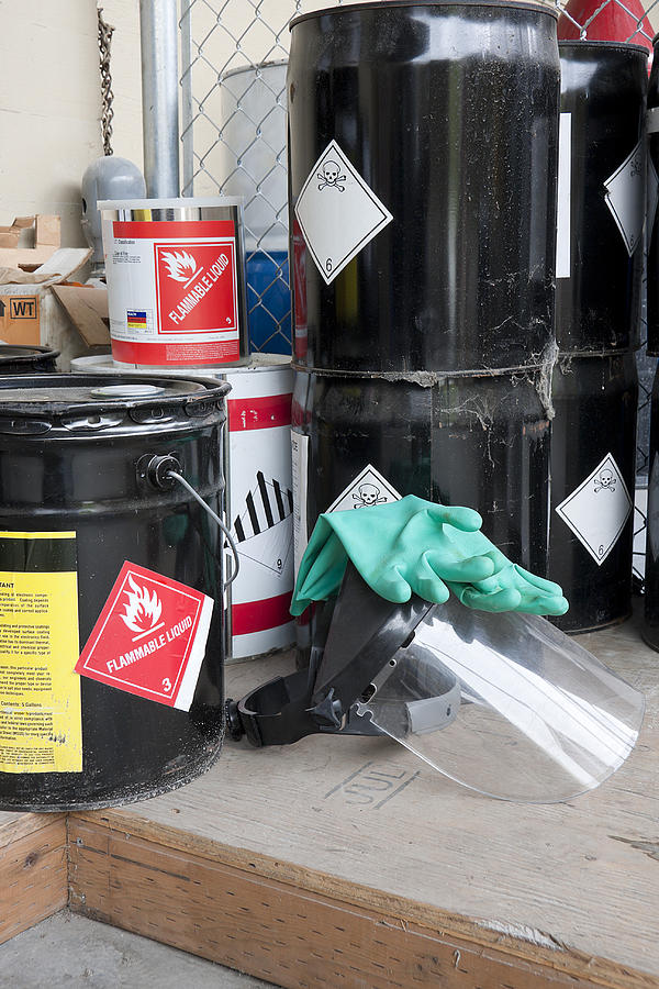 Drums and containers of poisonous and flammable substances Photograph by SteveDF