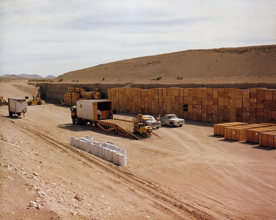 Drums Of Nuclear Waste Being Stored In A Trench Photograph by Us ...