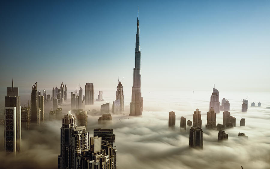 Dubai Skyline in early morning fog Photograph by © Naufal MQ