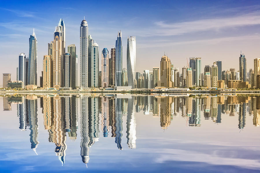 Dubai skyline reflection, Dubai Marina, United Arab Emirates Photograph by DieterMeyrl
