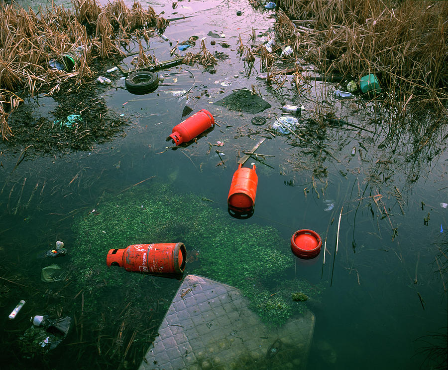 Dumped Gas Cylinders Photograph by Robert Brook/science Photo Library