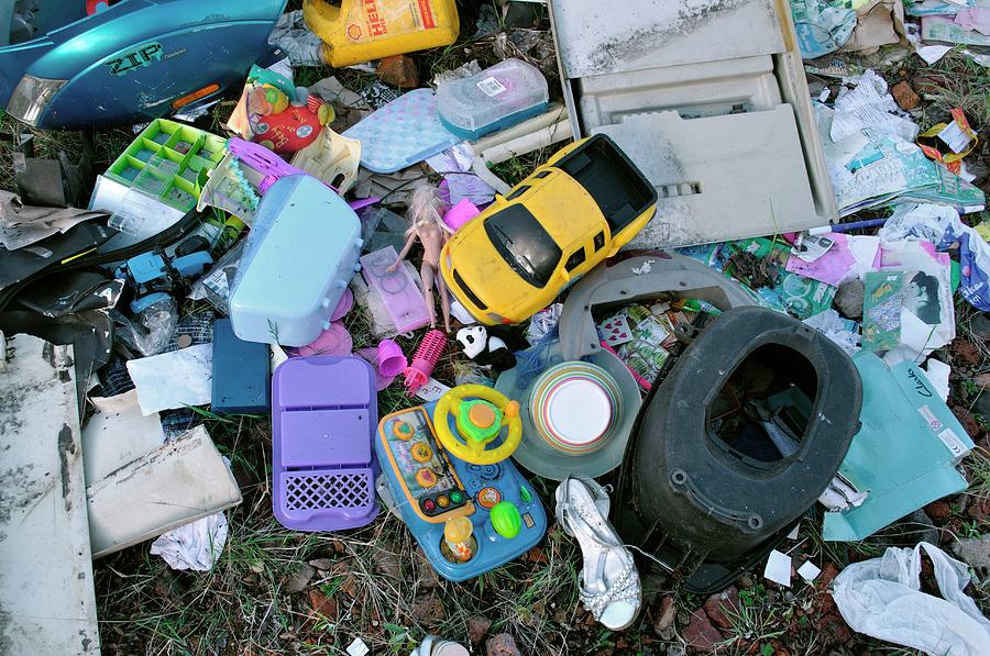 Toy Photograph - Dumped Toys And Plastic Objects by Robert Brook/science Photo Library