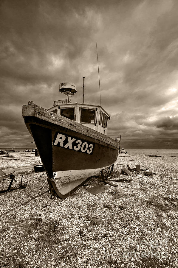 Dungeness Boat Under Stormy Skies Photograph by Bel Menpes