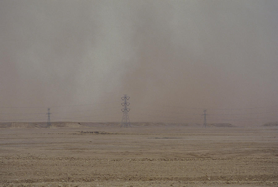 Dust Storm In Desert Photograph by Ray Ellis
