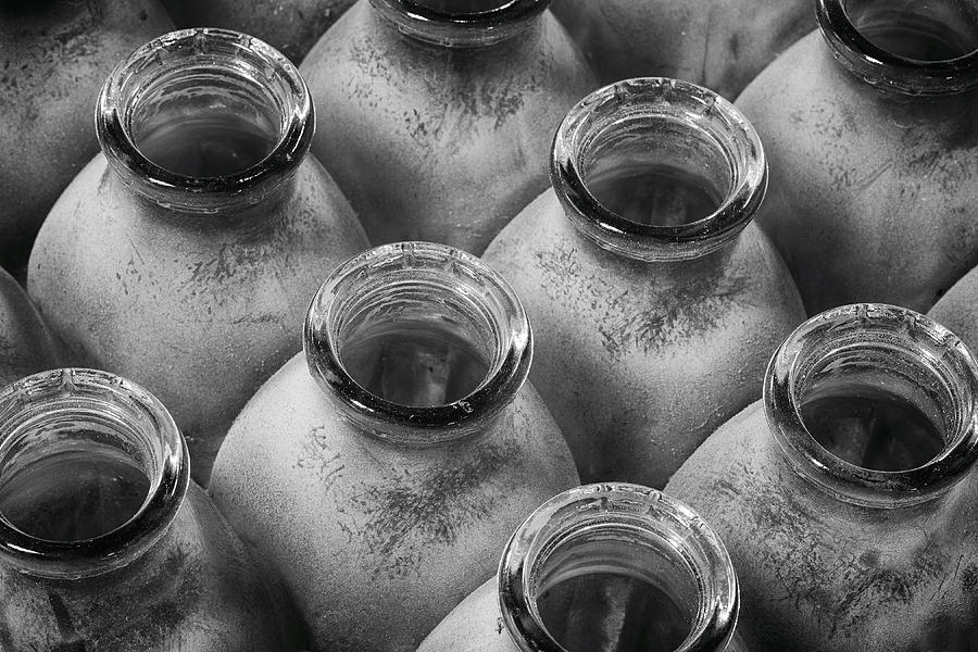 Dusty Milk Bottles Photograph by Denise Bush