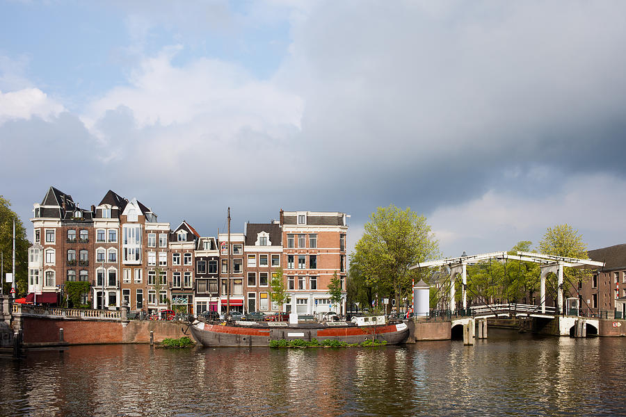 Dutch Houses by the Amstel River in Amsterdam Photograph by Artur ...