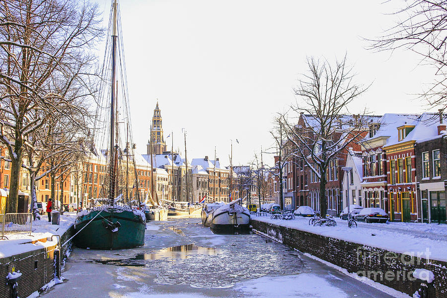 Dutch town in snow Photograph by Patricia Hofmeester