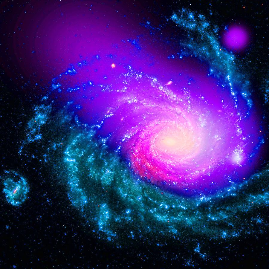 Dwarf Galaxy Caught Ramming Into a Large Spiral Galaxy Photograph by Robert Rhoads