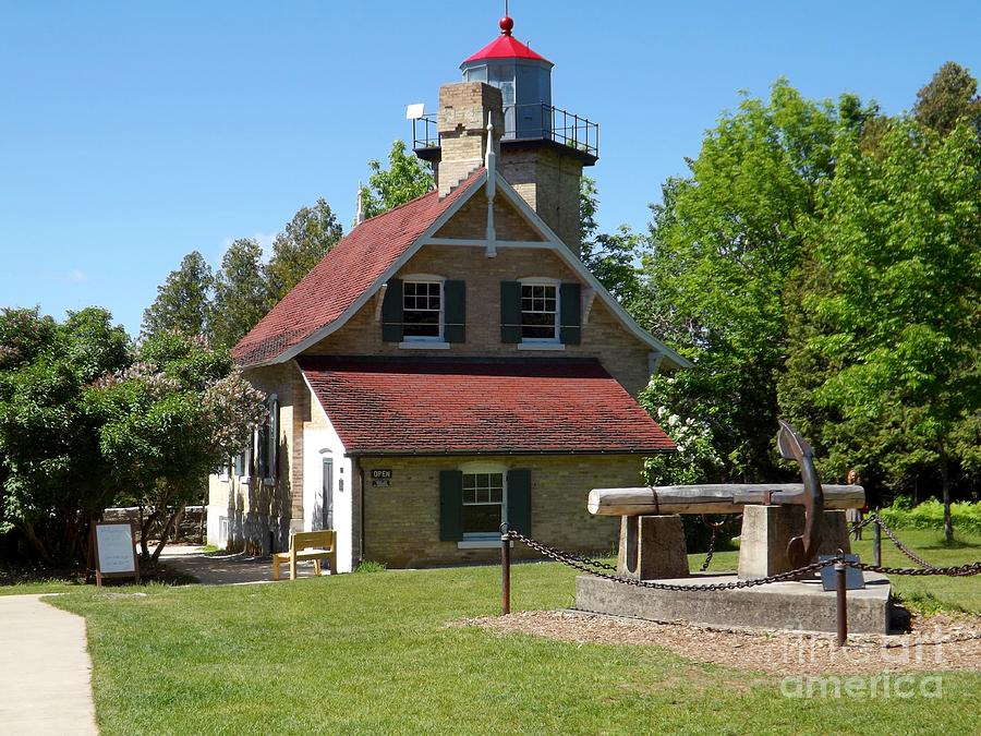 Eagle Bluff Lighthouse With Boat Anchor Photograph by Deb Schense