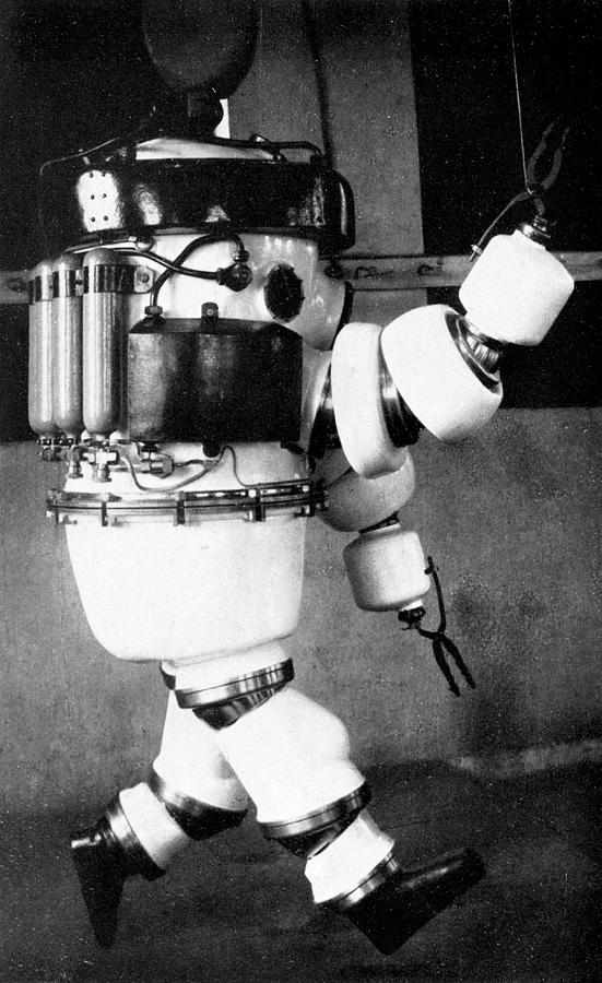 Black And White Photograph - Early 20th Century Diving Suit by Cci Archives