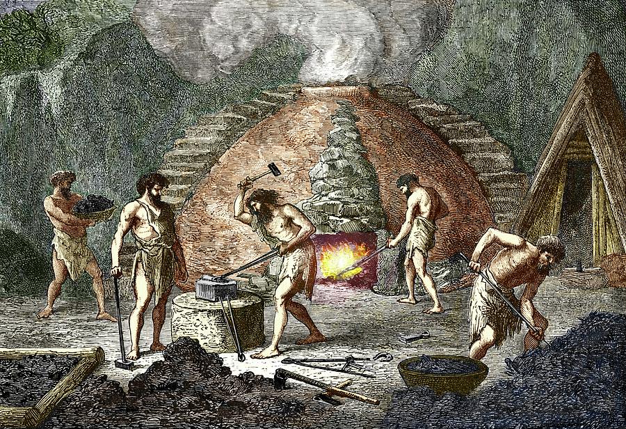 Prehistoric Photograph - Early Humans Smelting Iron by Sheila Terry