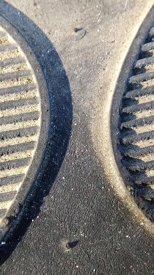 Abstract Photograph - Early light on tire I by Nadia Korths