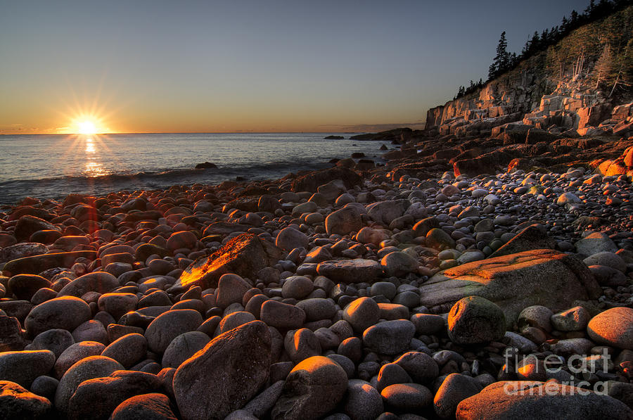 Early morning on a stone beach Photograph by Oscar Gutierrez