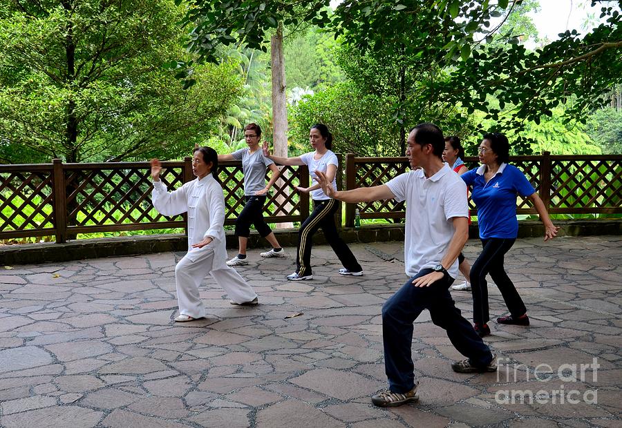 Early morning Tai Chi exercise in park Singapore Photograph by Imran Ahmed