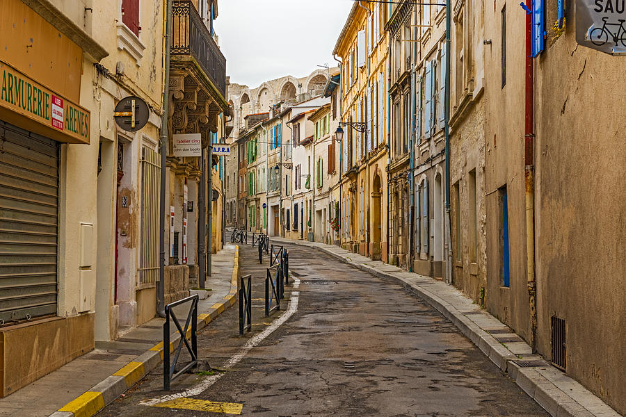 Early morning view at the street in old city of  Arles France Photograph by Marek Poplawski