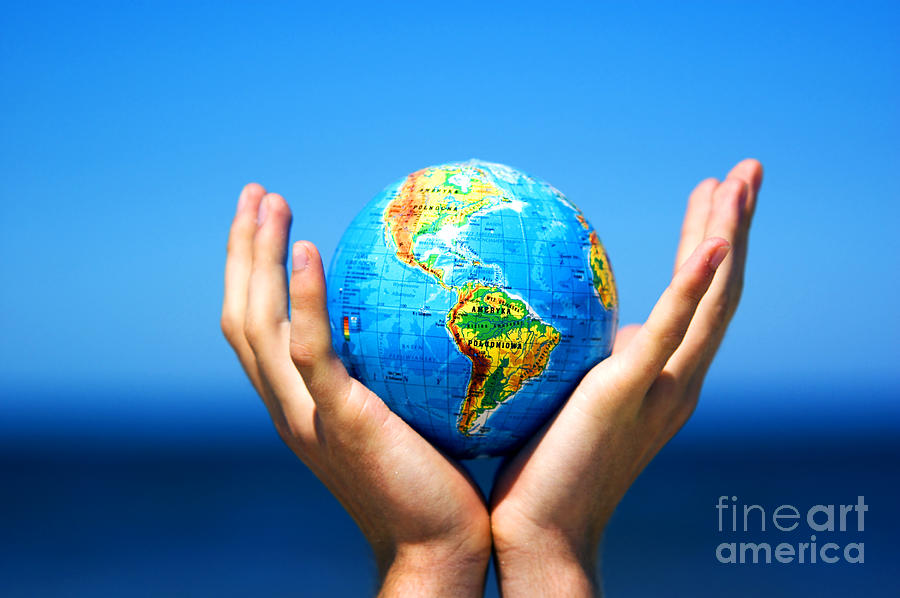 Nature Photograph - Earth globe in hands. Conceptual image by Michal Bednarek