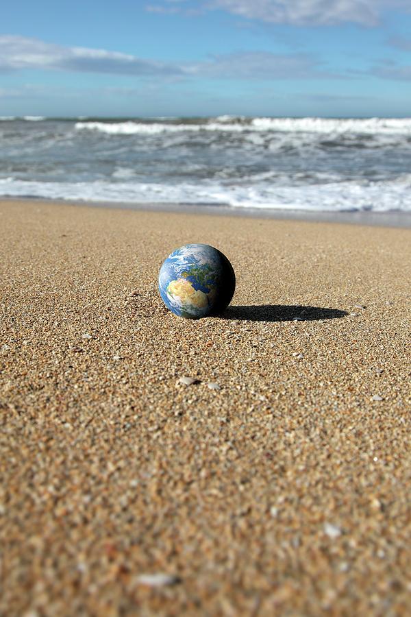 Earth On A Beach Photograph by Detlev Van Ravenswaay