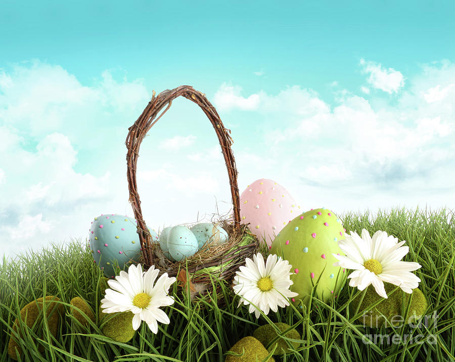 Easter eggs with  basket in the grass Photograph by Sandra Cunningham