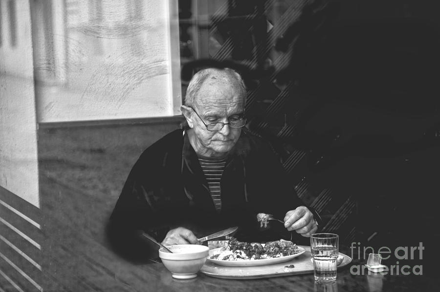Eating Alone Photograph by Rick Bragan