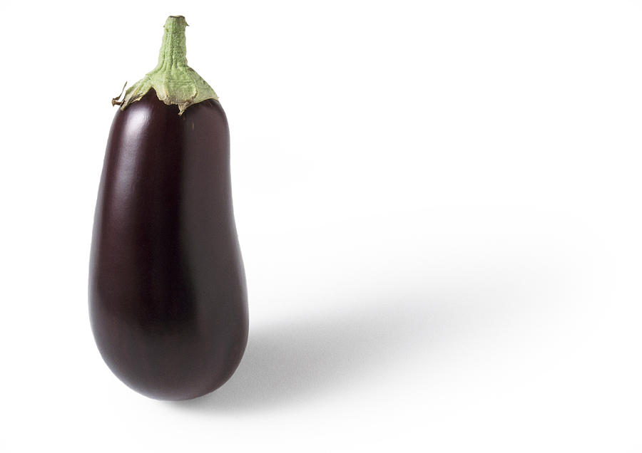 Eggplant standing on end, close-up Photograph by Isabelle Rozenbaum