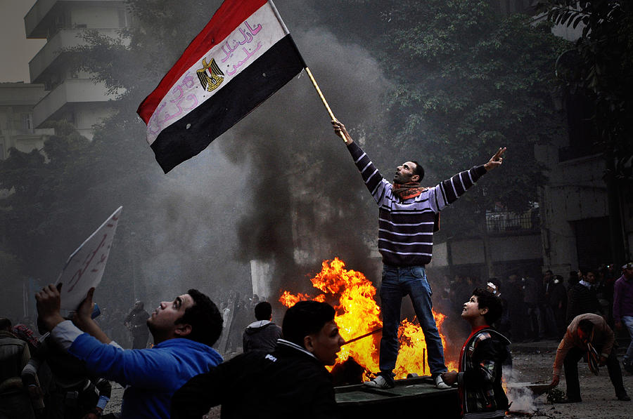 Egyptian protesters clash with the army Photograph by Jonathan Rashad Egyptian protesters clash with the army Photograph by Jonathan Rashad