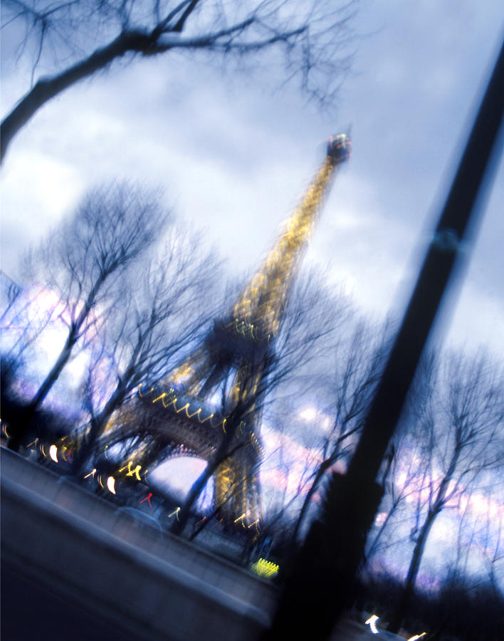 Eiffel on the Move Photograph by Mike McGlothlen