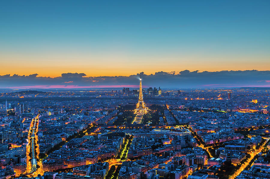 Eiffel Tower And Paris Skyline At Night Photograph by Pawel Libera