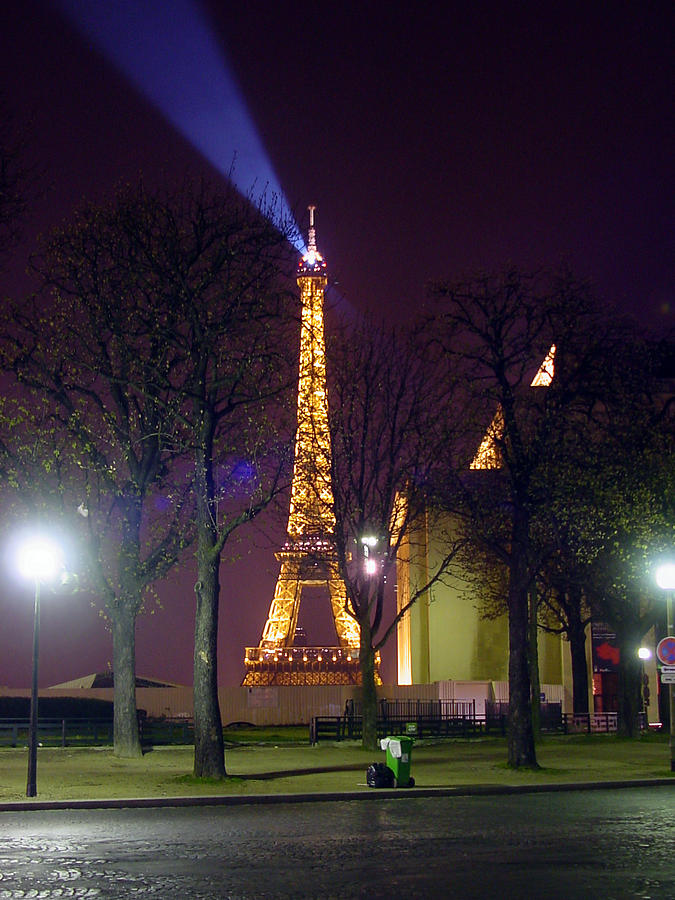 Eiffel tower as a lighthouse Photograph by Mieczyslaw Rudek