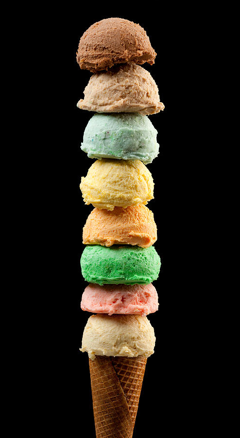 Eight scoops of ice creams with cone on Black Background Photograph by Aleaimage