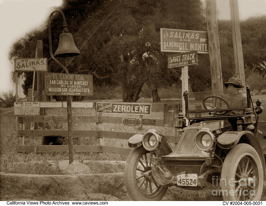Car Photograph - El Camino Real Mission Bell near the Hotel Del Monte Circa 1910 by Monterey County Historical Society