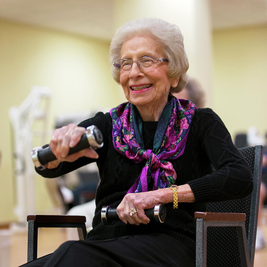 Female Photograph - Elderly Seated Work-out by Alex Rotas