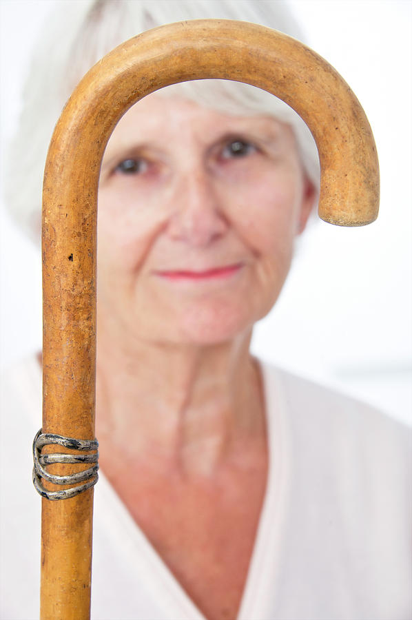 Elderly Woman And Walking Stick Photograph by Lea Paterson